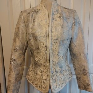 Reba size small silver and cream fitted jacket.